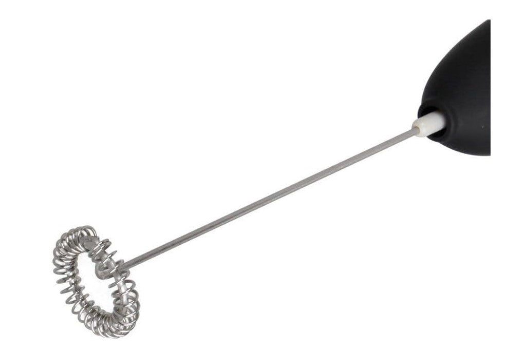 Primer plano del cabezal de batido de metal del espumador de leche eléctrico. Diseño de resorte en espiral para crear espuma de leche o matcha.